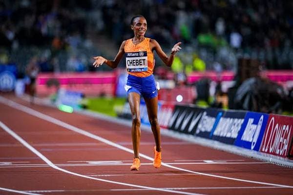 Beatrice Chebet of Kenya crossing the finish line